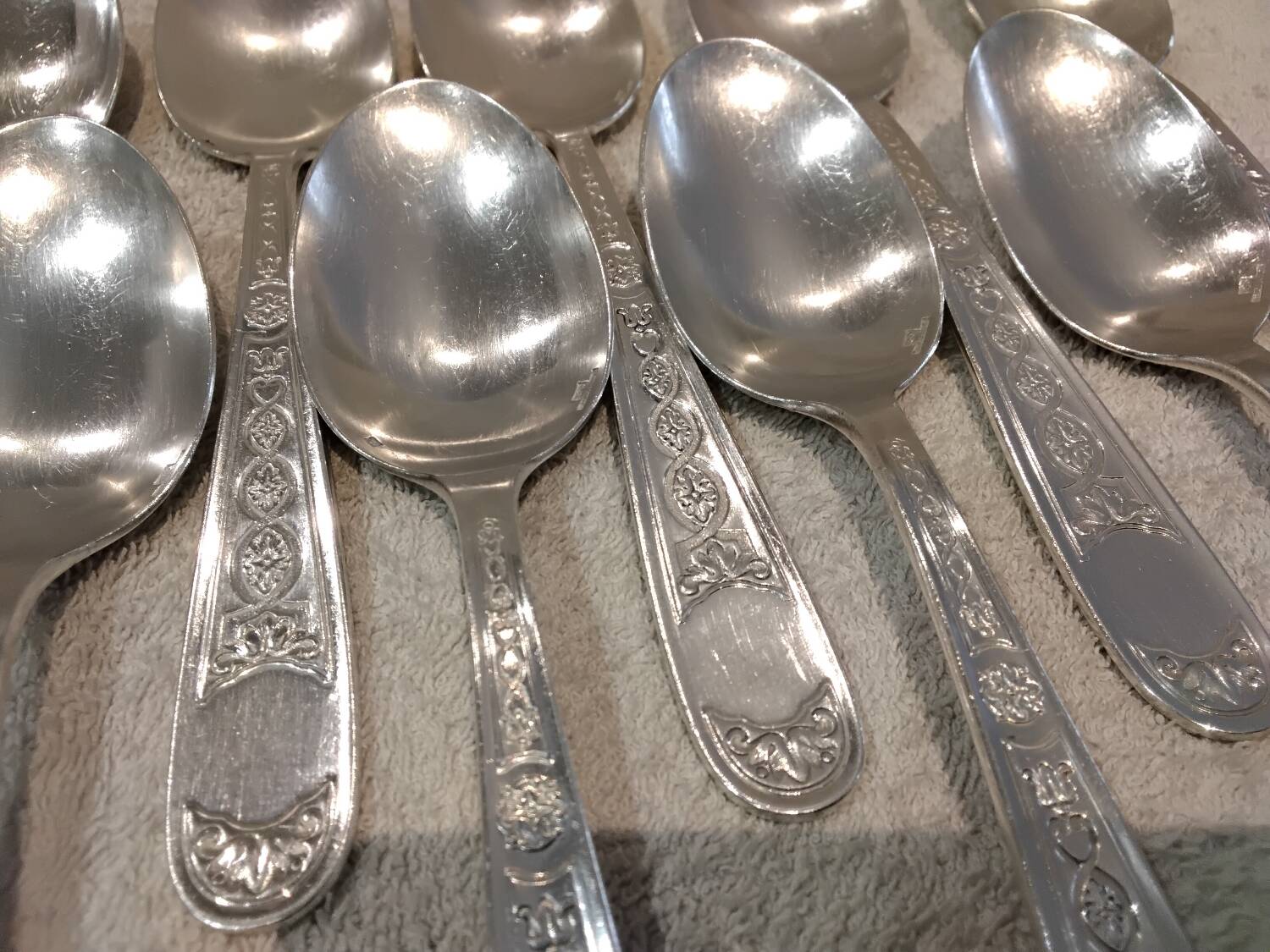 11 silver-plated soup spoons by Christofle Villeroy & Boch, striped