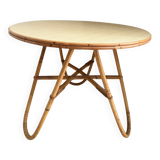 Vintage round tripod side table in rattan