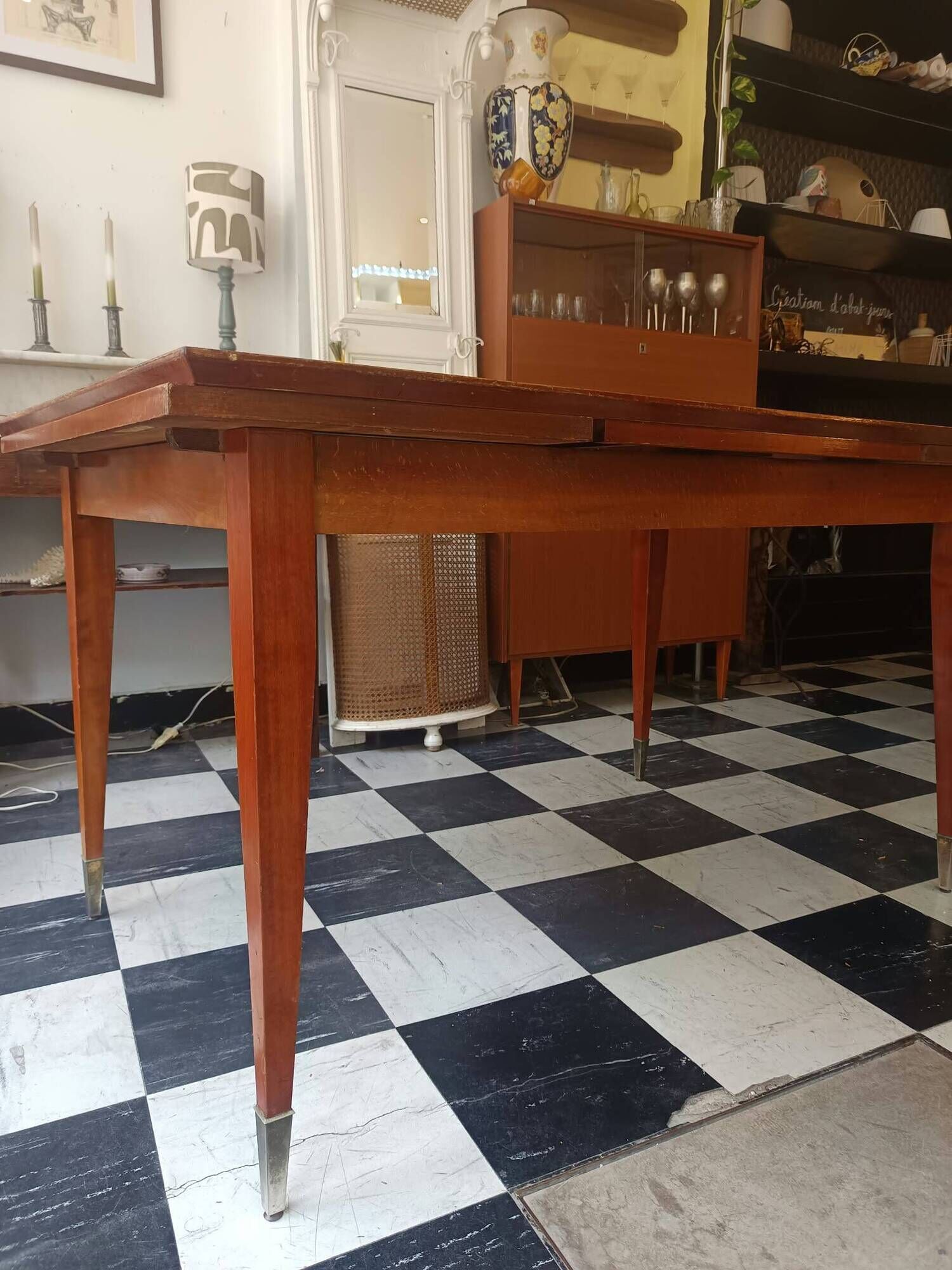 Mid-century vintage coffee table with tapered legs.
