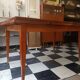 Mid-century vintage coffee table with tapered legs.
