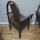 Paire de fauteuils Baumann en hêtre teinté modèle "Argos"