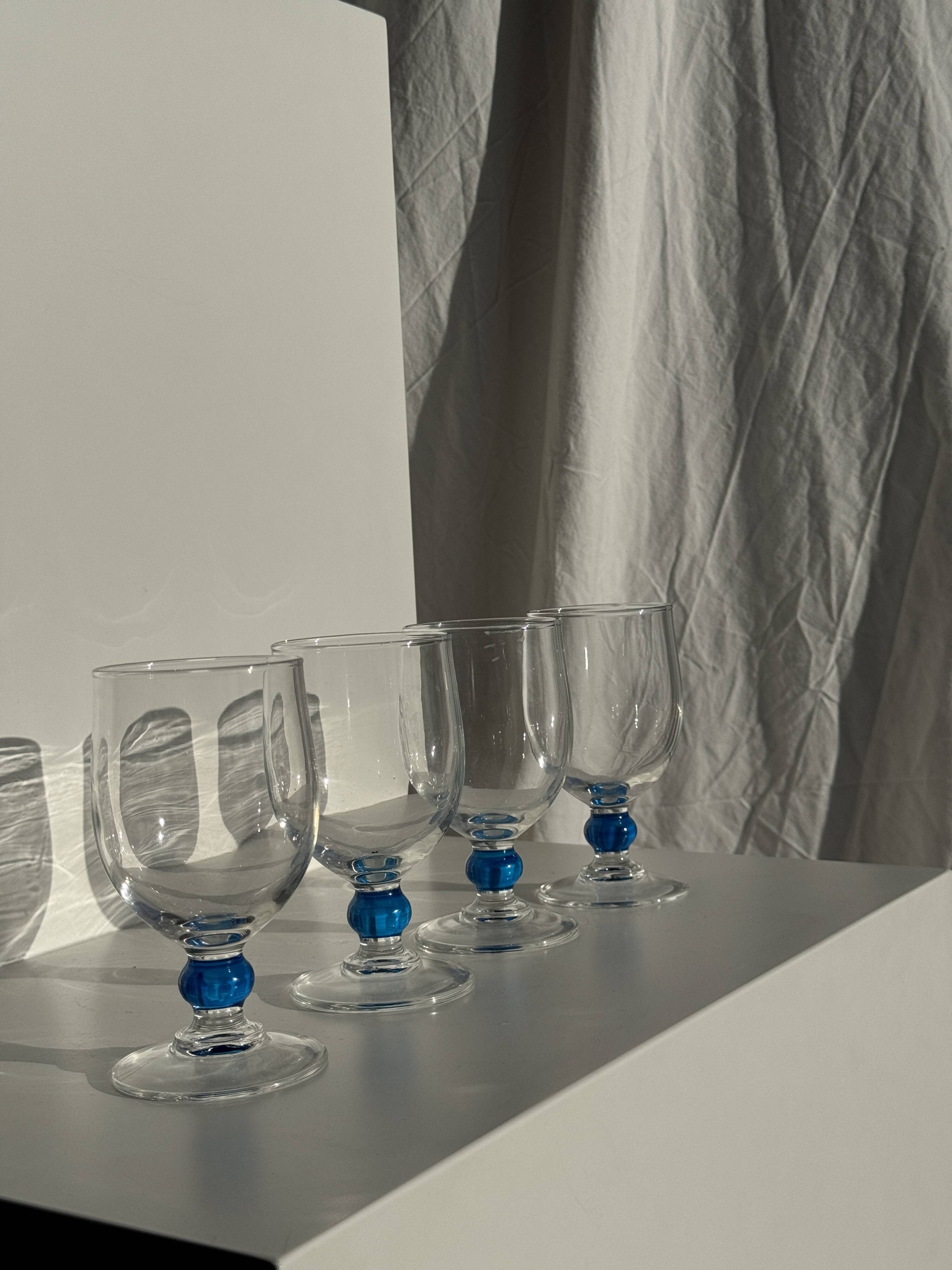 Set of 4 blue ball stemmed water glasses