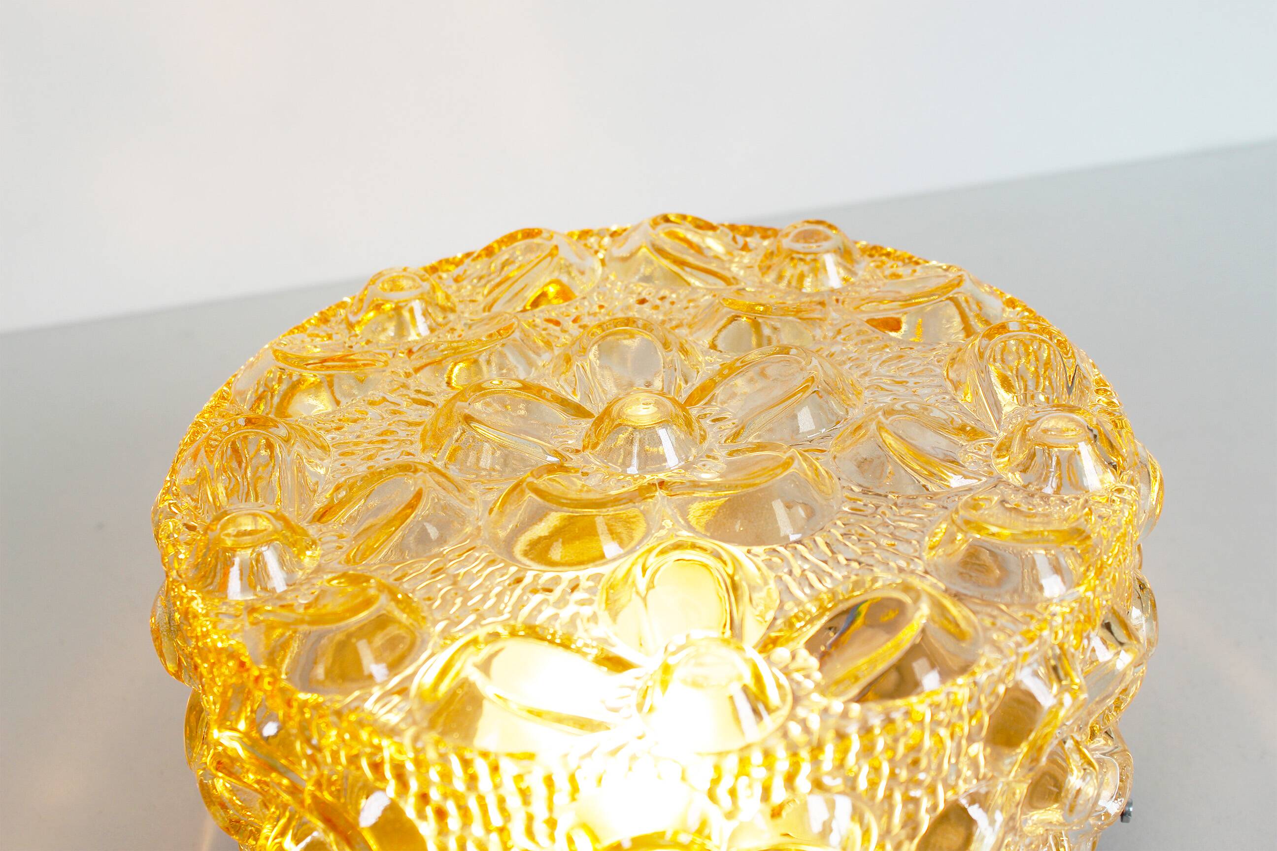 Original 1970’s amber Glass ‘Flower’ wall lamps by Erco