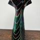 Vintage iridescent glass vase with ribbed design and ruffled neck, H 21 cm.