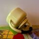 Old kettle in yellow enamelled sheet metal and Bakelite