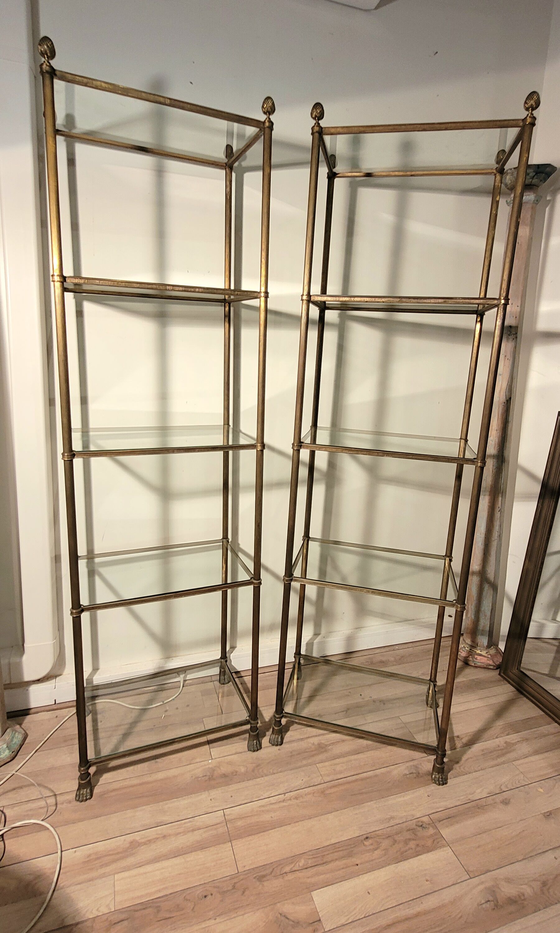 Pair of brass and gilded bronze shelves feet lion's feet