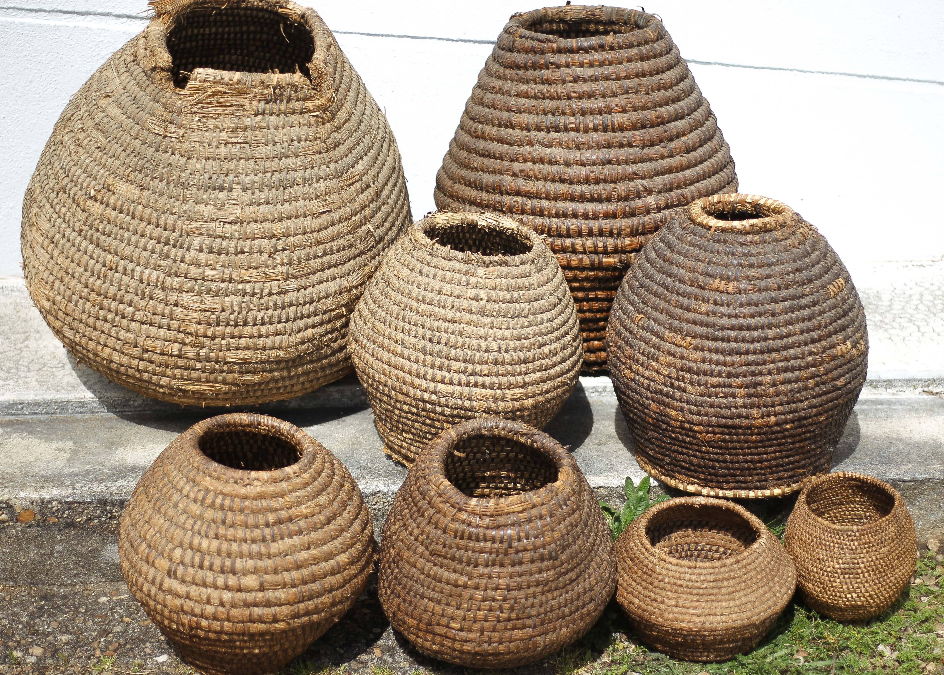Old basket, burgundy straw and bramble, woven basket, interior decoration, pantry, flowerpot