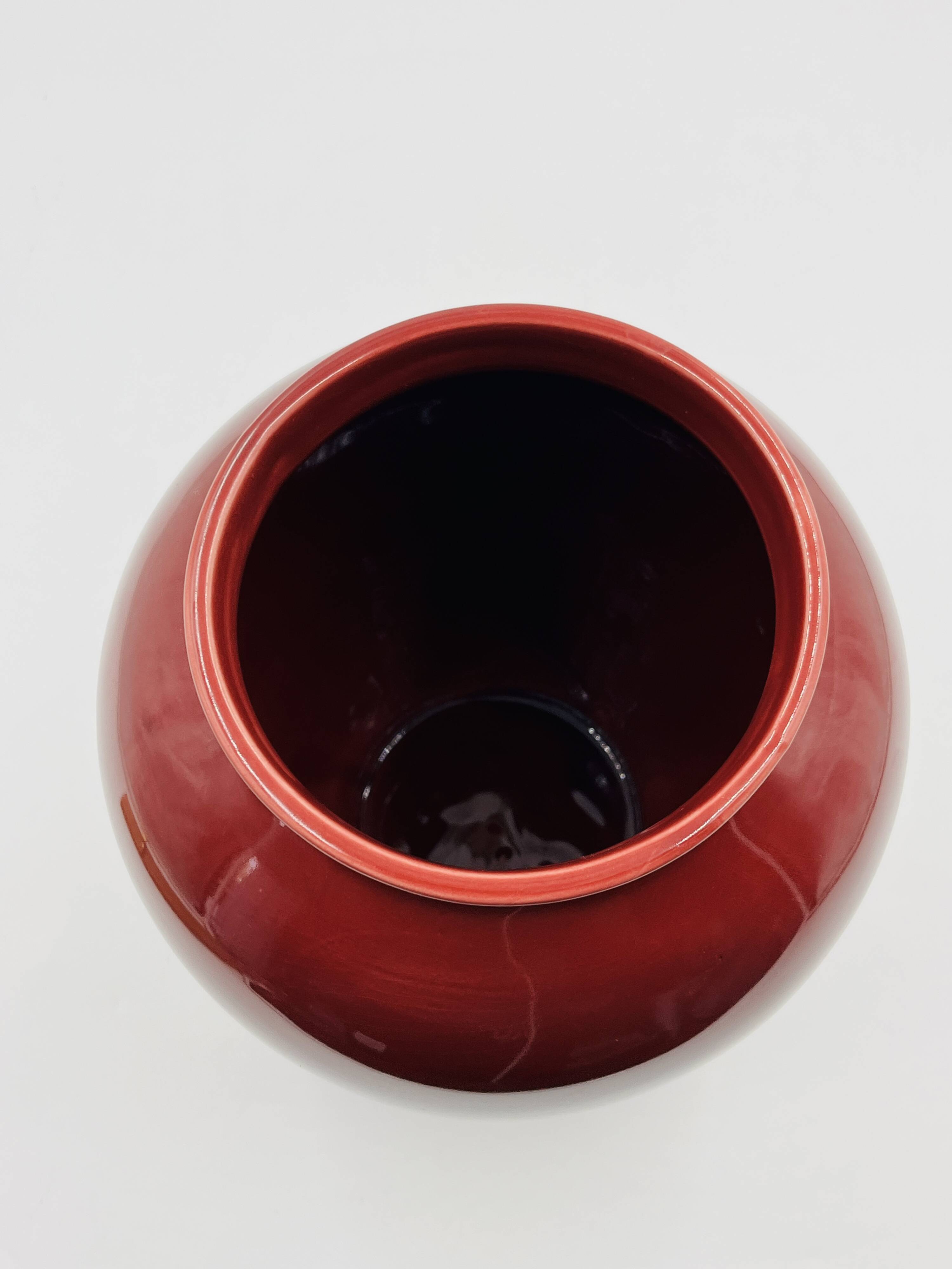 Vintage vase in glazed burgundy ceramic