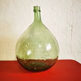 Green demijohn contains 12 liters