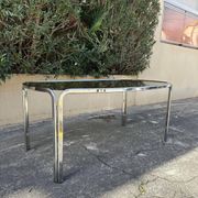Vintage curved rectangular dining table in smoked glass and metal.