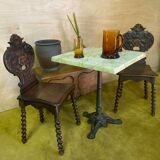 Duo of carved wooden chairs