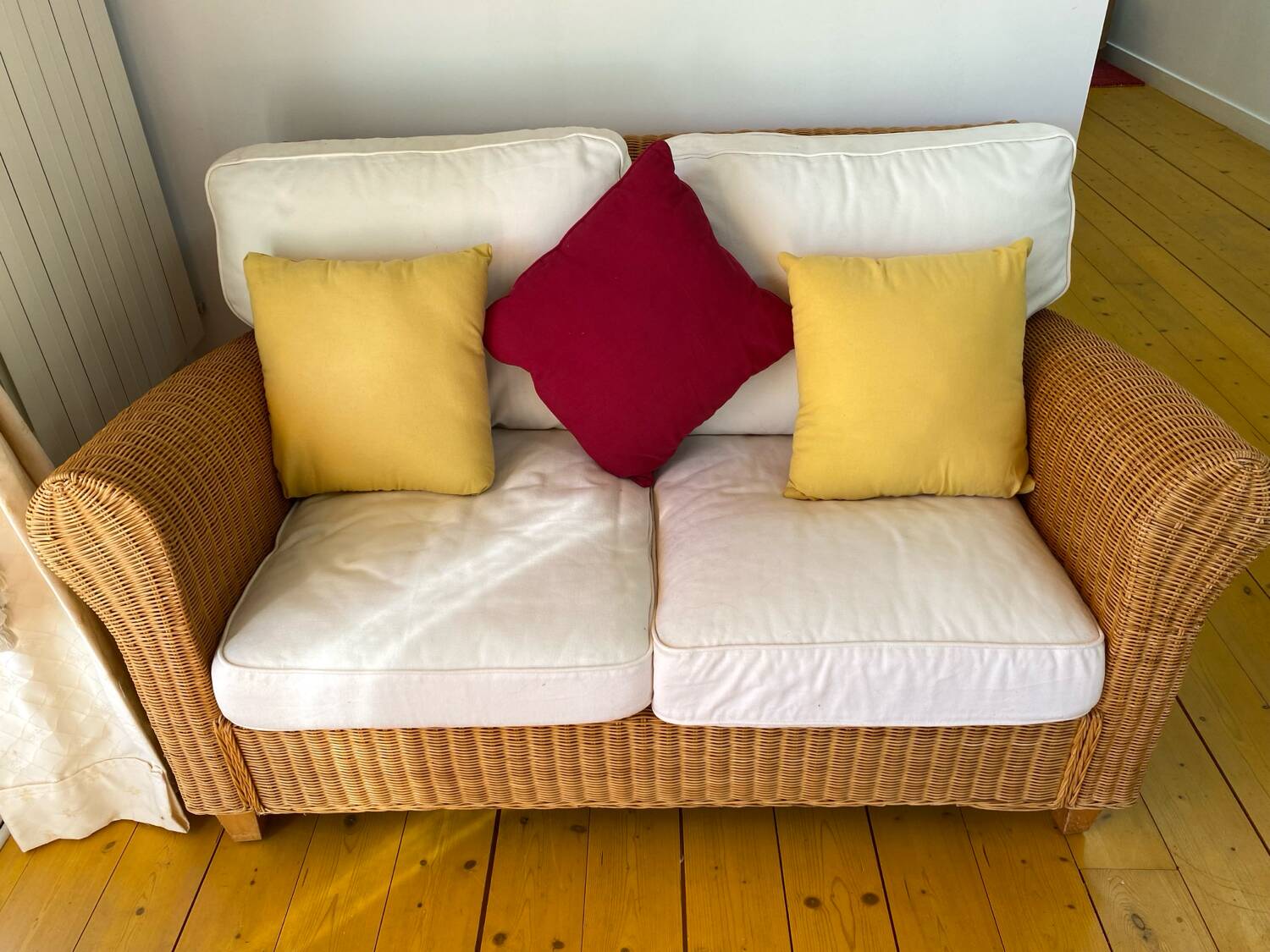 Antique 2-seater rattan sofa from the 70s