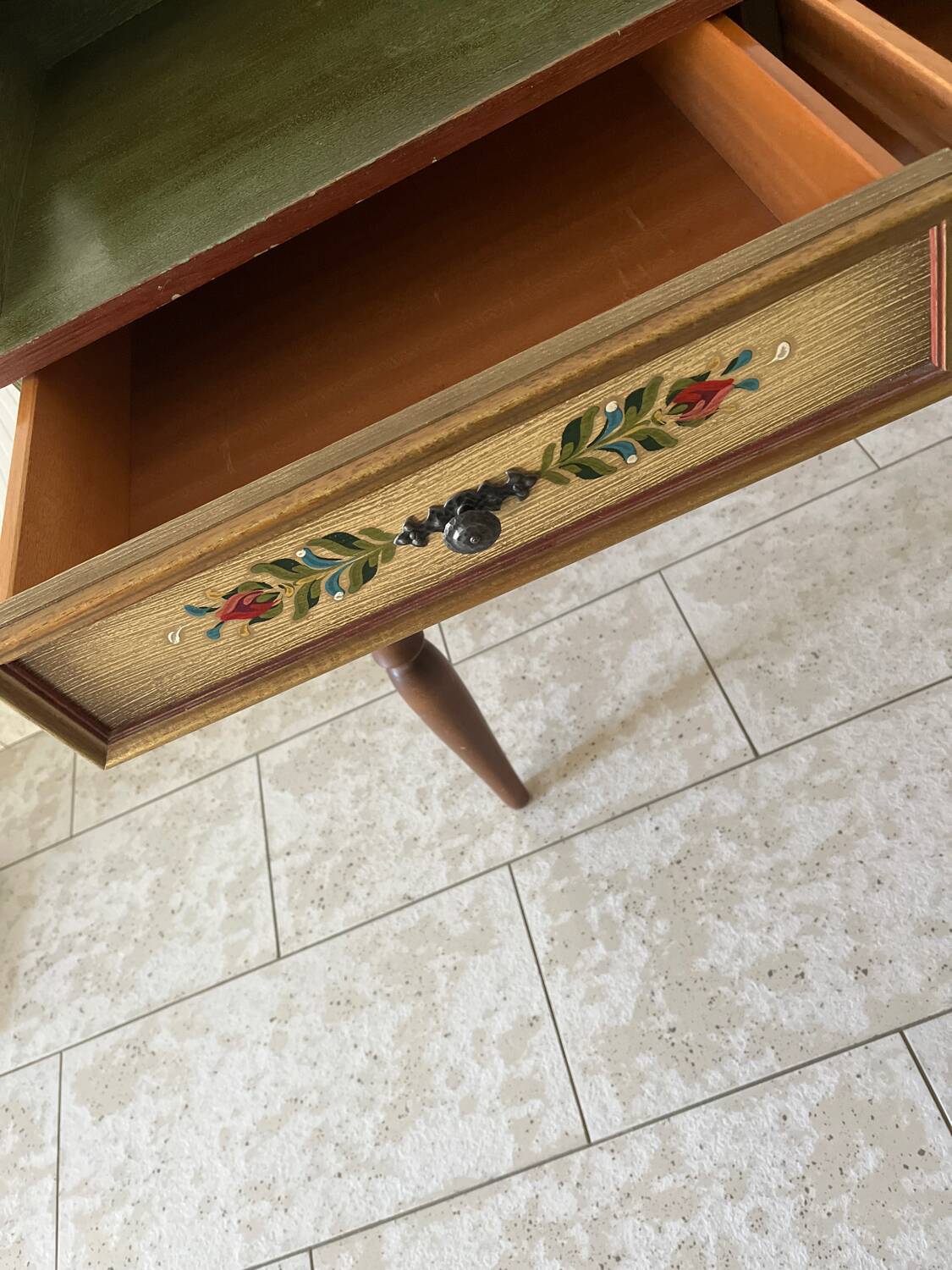 Wooden dressing table with olive green chair and floral patterns