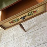 Wooden dressing table with olive green chair and floral patterns