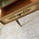 Wooden dressing table with olive green chair and floral patterns