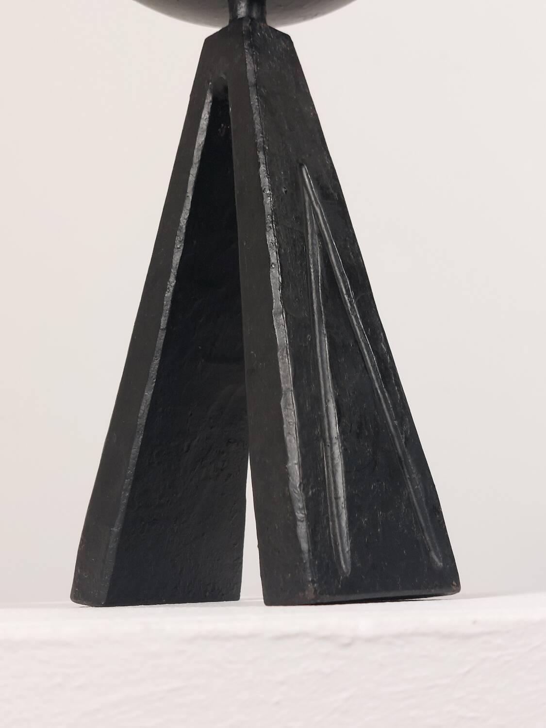 Vintage candle holder made of hand-forged metal, in a brutalist style.