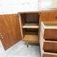 1960s teak sideboard with 4 drawers, 2 doors, and a mirror.