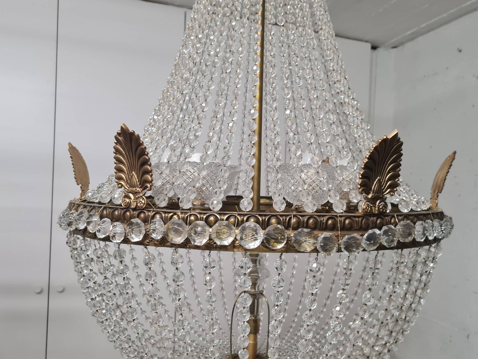 Large chandelier from the late 19th century in crystal and bronze.