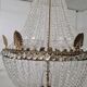 Large chandelier from the late 19th century in crystal and bronze.