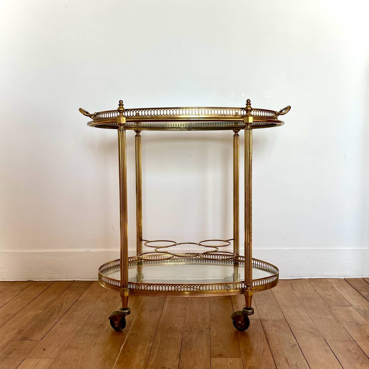 Vintage serving trolley in gilded brass and glass