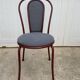 Metallic burgundy bistro chair for restaurants and communities with gray fabric