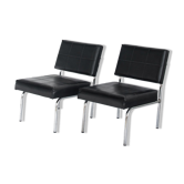 Pair of vintage low armchairs in chrome metal and skaï, Spain 1970