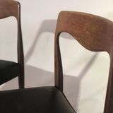 Suite of 4 chairs in teak and skai