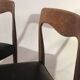 Suite of 4 chairs in teak and skai