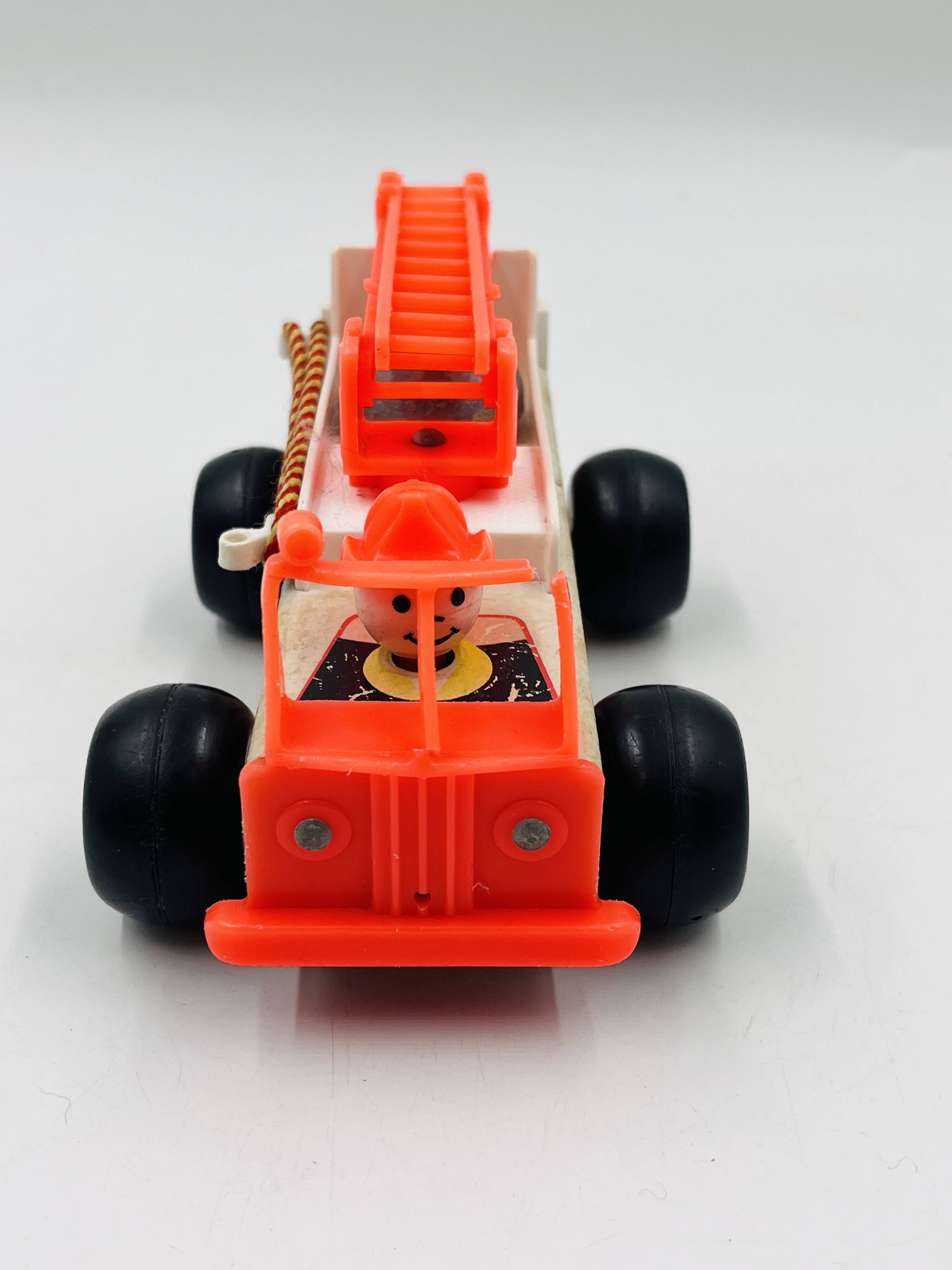 Set of 4 Fisher-Price wooden toys from the 1960s