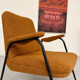 Vintage orange boucle armchair, French design from the 1950s.