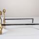 Pair of sculptural brutalist bronze fireplace andirons, 1970s