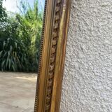 19th century Louis XVI style mirror in wood gilded with gold leaf, 74x150cm