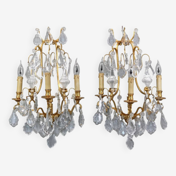 Pair of golden Louis XVI style sconces in bronze & bohemian crystal