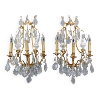 Pair of golden Louis XVI style sconces in bronze & bohemian crystal