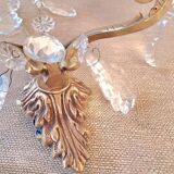 Gold wall light with tassel
