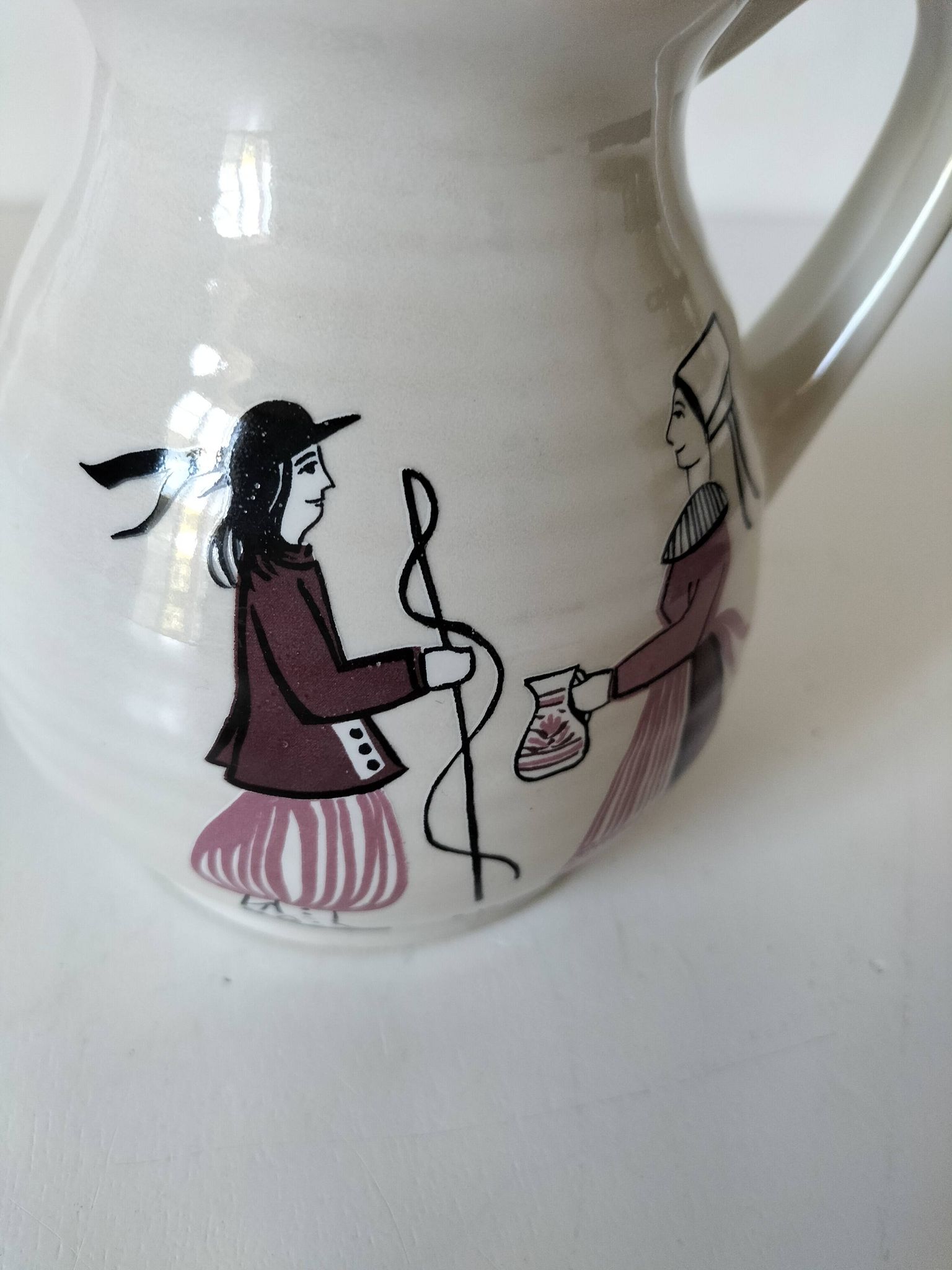 Ceramic pitcher from Quimper, created by Dominique Villard.