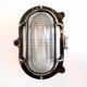 Antique Holophane wall lamp in patinated bronze