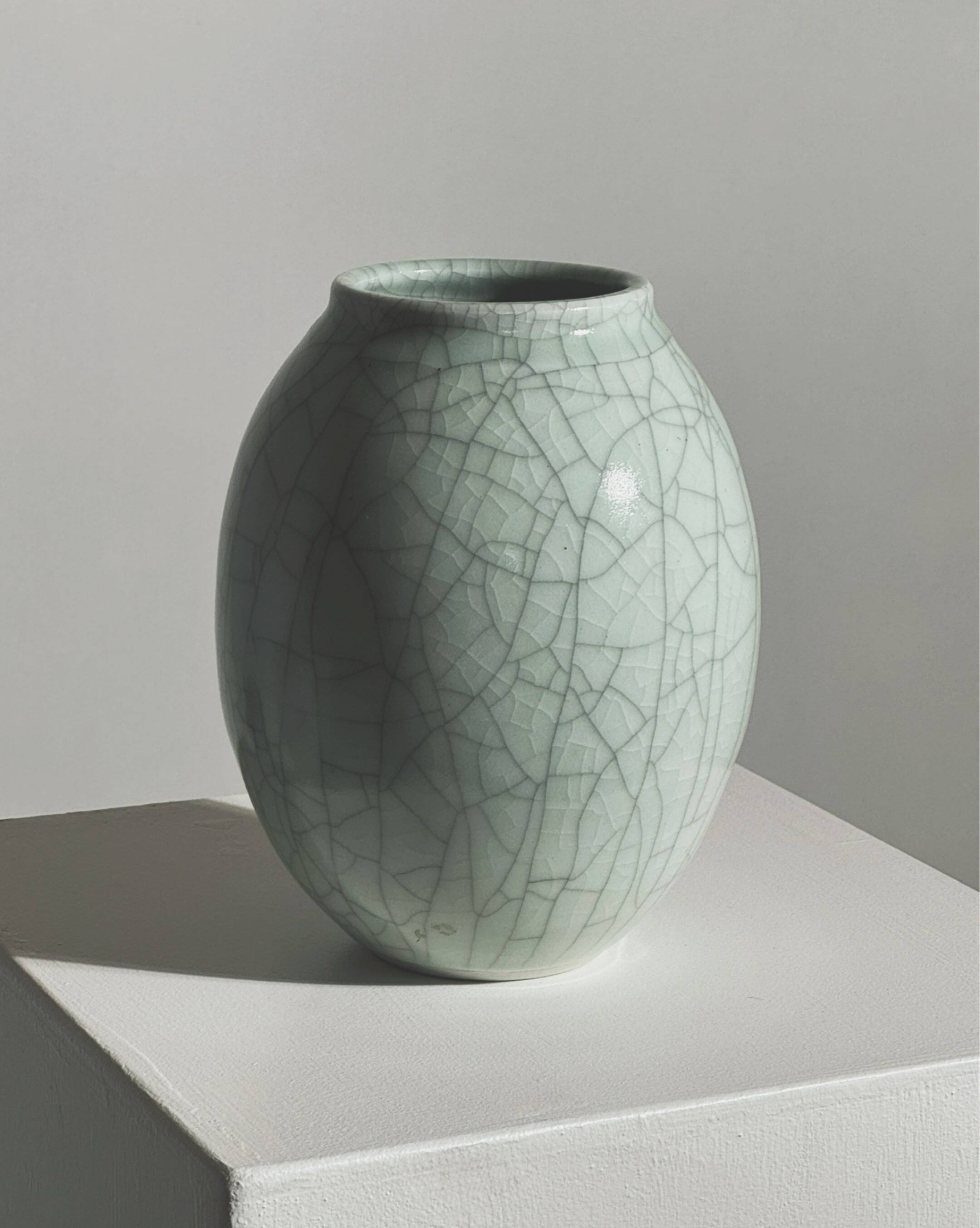 White ceramic vase by Roland Breton