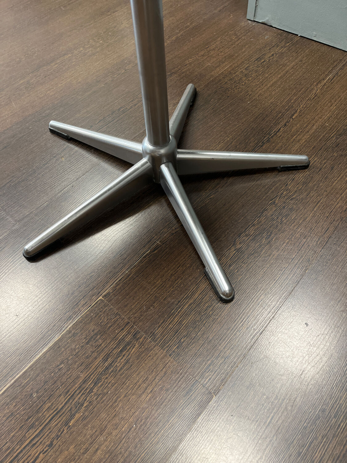 Old hairdressing chair and its footrest