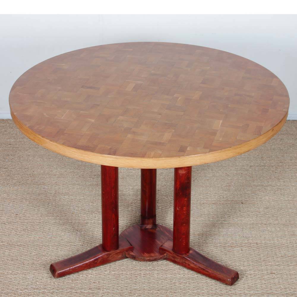 Round wooden dining table from the 1980s.