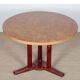 Round wooden dining table from the 1980s.