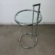 Chrome and glass design side table, adjustable.