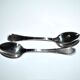 Ercuis set of 2 Trianon silver-plated dessert spoons with crossed ribbon, 15 cm