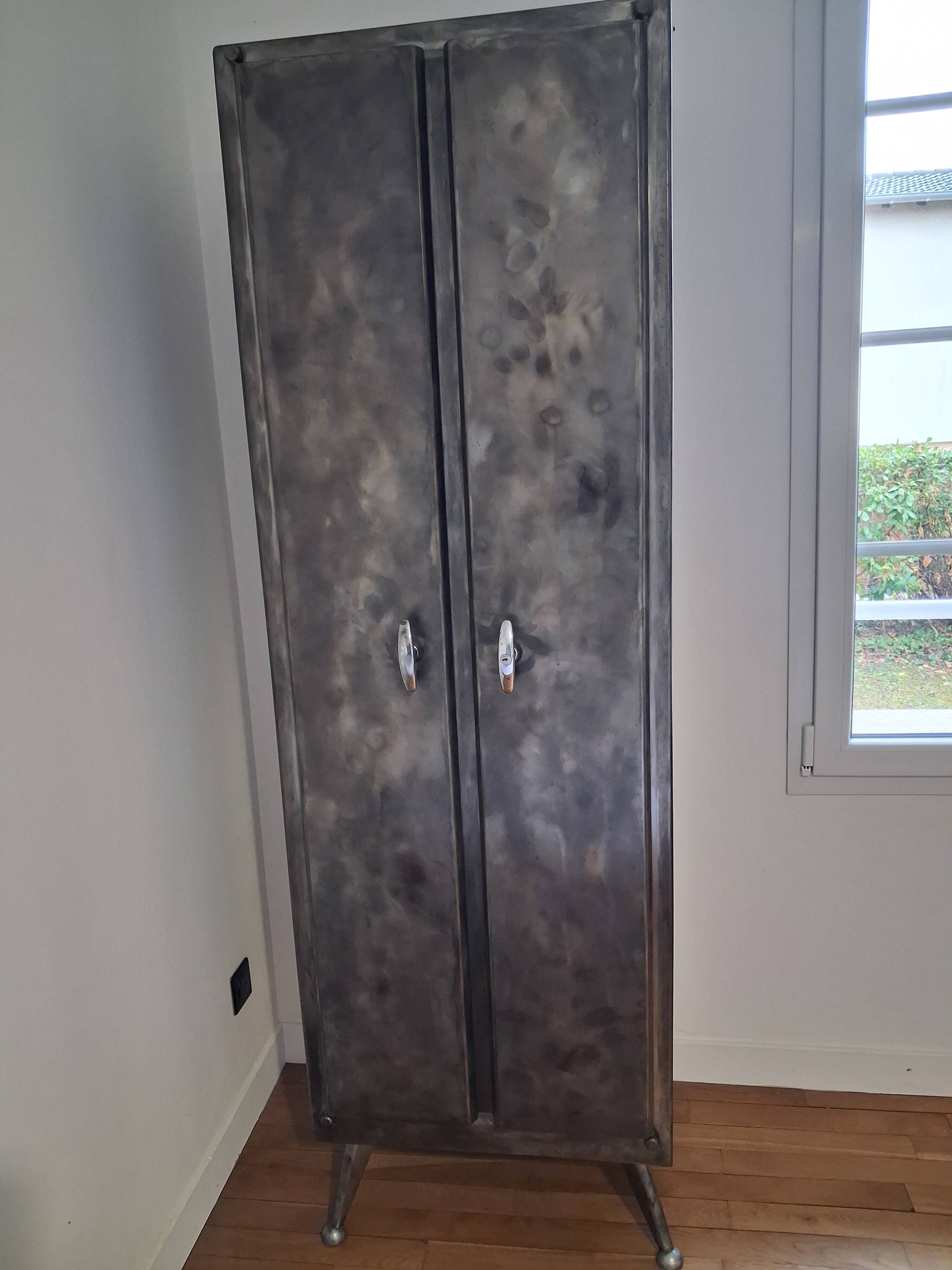 1960s factory infirmary metal cabinet with ball feet and compass.