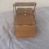 Sewing box in old varnished wood