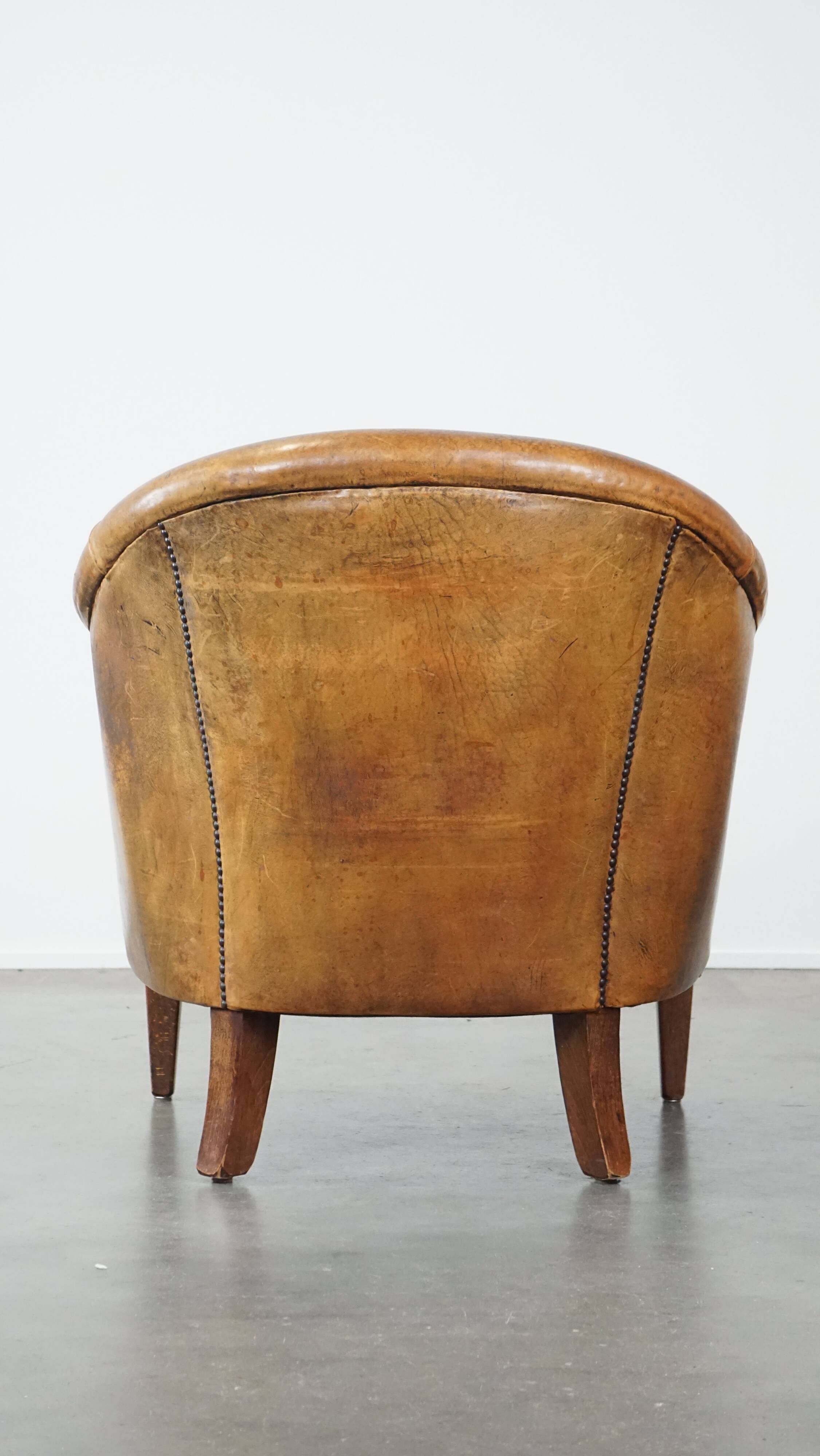 Vintage club armchair in sheepskin leather