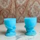 Pair of blue opaline egg cups signed SV Schmid Glassworks