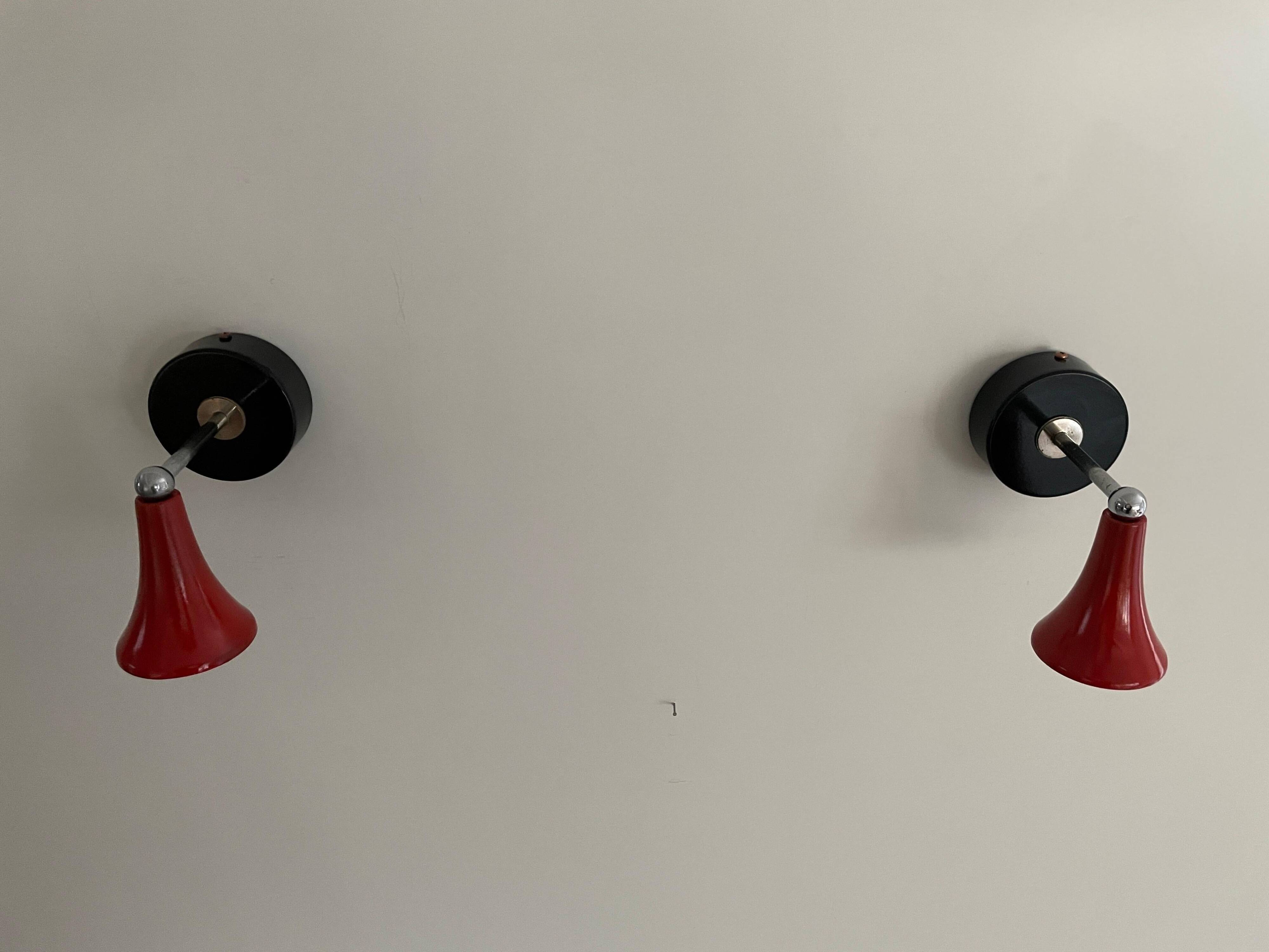 Pair of red metal wall lights AGE, 1970s, Italy