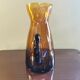 Vintage pitcher in amber glass