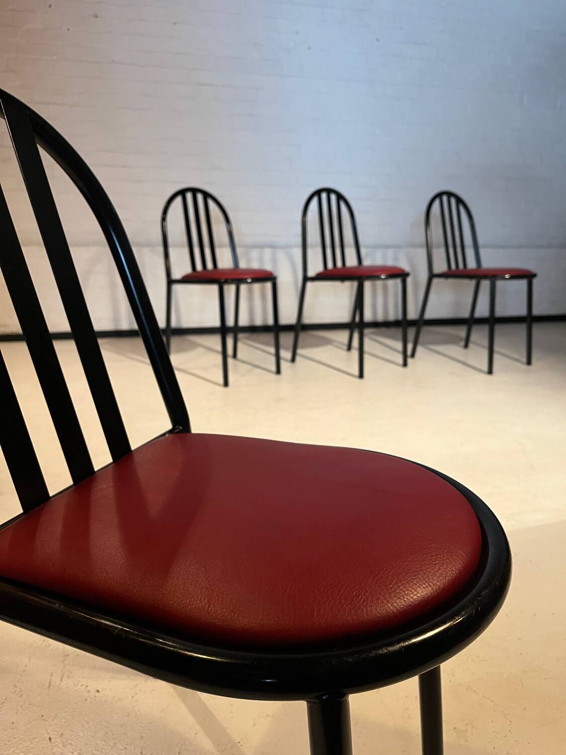 4 leather and steel chairs, designed by Robert Mallet-Stevens